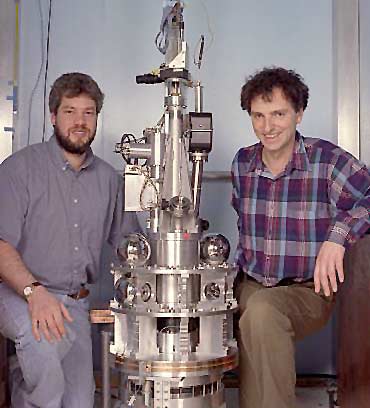 Steve Merkowitzz (l) and Jens Gundlach (r) with the Cavendish apparatus developed at the University of Washington. (Credit: Mary Levin, University of Washington)