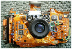 Olympus Stylus camera with skins removed