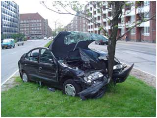 A car accident where the driver ran into a tree.