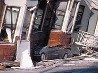 This building in San Francisco sunk into the ground after the 1989 Loma Prieta earthquake. (photo courtesy of NASA)