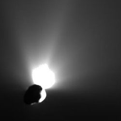 This image shows the view from Deep Impact's flyby spacecraft as it turned back to look at comet Tempel 1. 