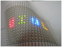 A flexible array of LEDs mounted on paper. 