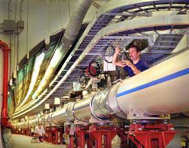 Curving tube of the RHIC. Most of the volume of the tube is occupied with magnets and liquid helium refrigeration. (photo courtesy of Brookhaven National Laboratory)