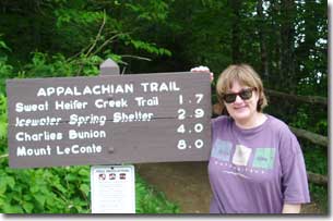 Dr. Cizewski standing next to sign for the Appalachian trail.