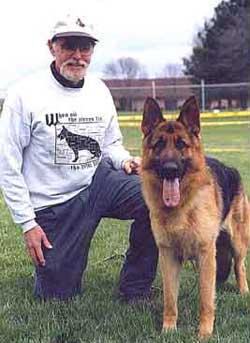 David Landau and one of his German Shepherds