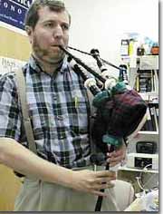 Jorge Pullin playing the bagpipe.