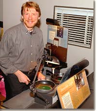 Rob Semper cooks up an experiment exhibit. 