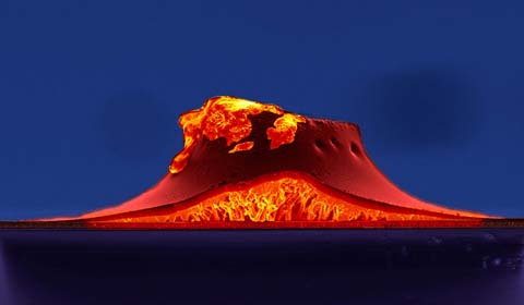 An errant speck of dust likely settled on this cross-section of a thin-film solar cell during the manufacturing process, causing a protrusion that looks like an erupting volcano.