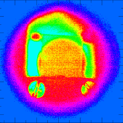 An erbium-doped glass cools when hit by laser light, as measured in the central yellow-red region of this infrared image. Other dopants can accomplish the same trick, but erbium is better suited to common laser wavelengths and powers.