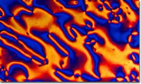  Cigar-shaped liquid crystal molecules move randomly but can all point in the same direction, leading to pretty colors. 