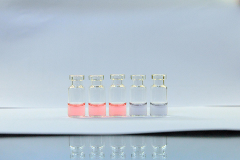 Solutions of gold nanoparticles of various sizes. The size difference causes the difference in colors.