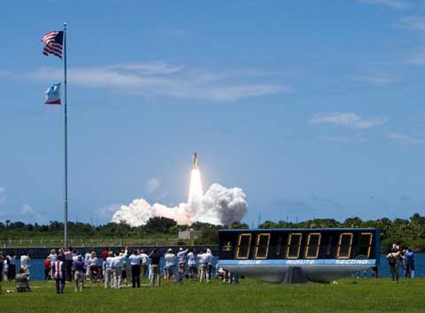 The launching of the space shuttle Discovery